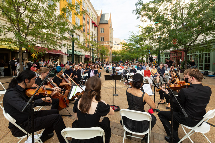 St. Louis Symphony Orchestra performing on the South 40 with the student performers