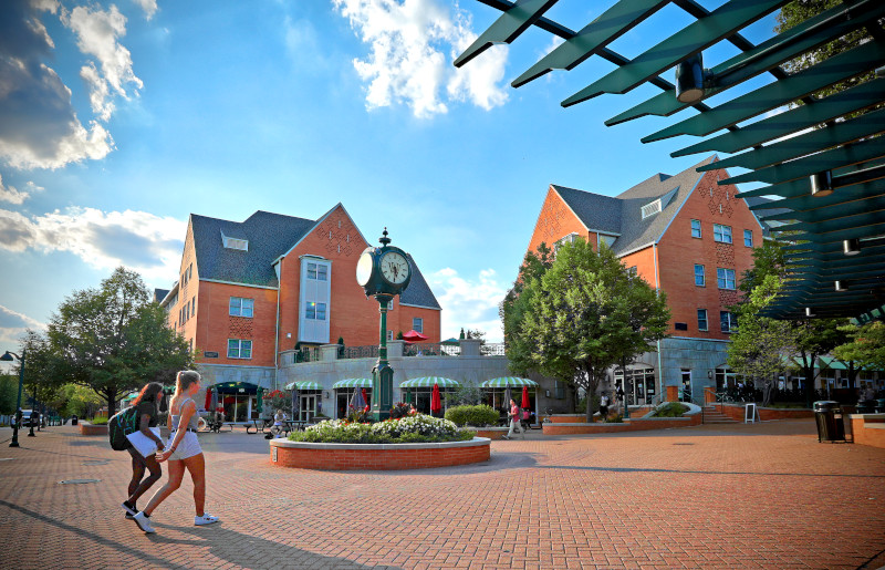 South 40 clocktower with students walking