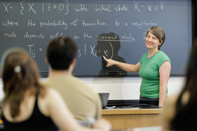 A faculty member teaches Data Science for Complex Networks to students.